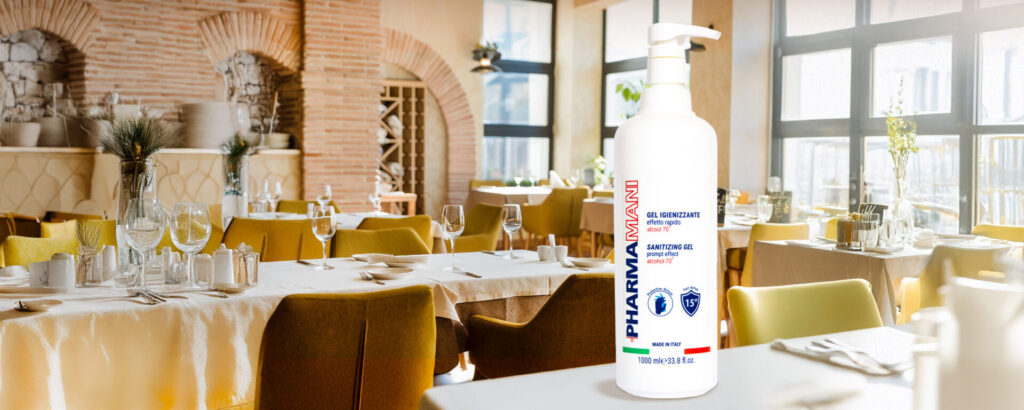 Flacone da un litro Pharmamani sul tavolo di un ristorante